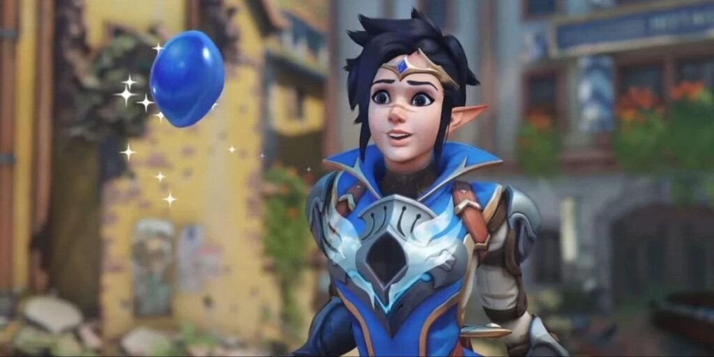 Lena in elaborate blue and silver armor stands in a vibrant outdoor setting, a blue balloon floats nearby with sparkles.