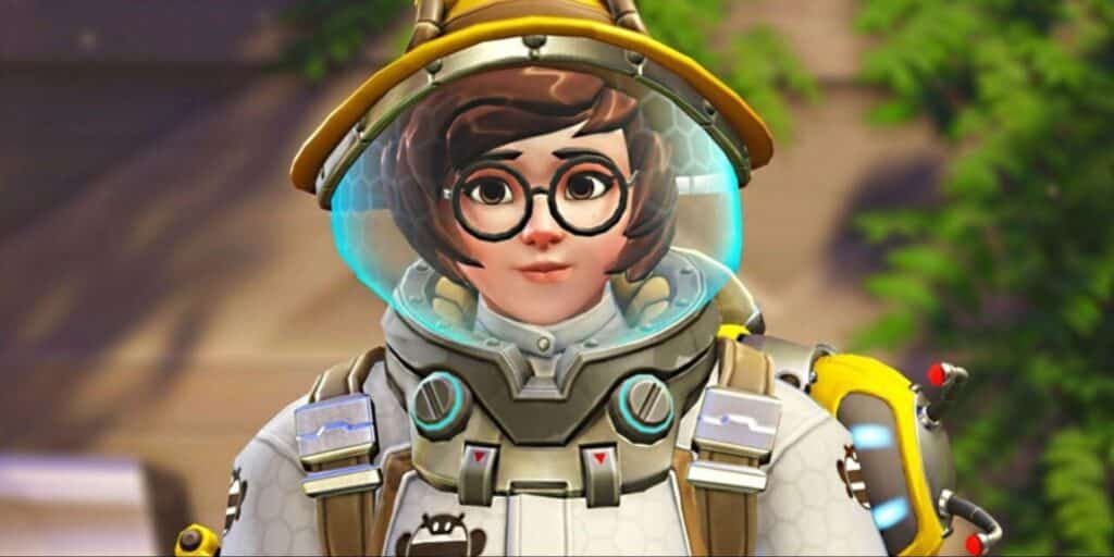 Mei in her Beekeeper skin from Overwatch 2, wearing a white suit with a clear helmet and bee-themed gear