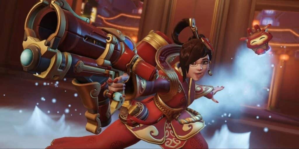 Mei in her Luna skin from Overwatch 2, wearing an ornate red and gold Lunar New Year outfit while aiming her weapon and deploying her drone